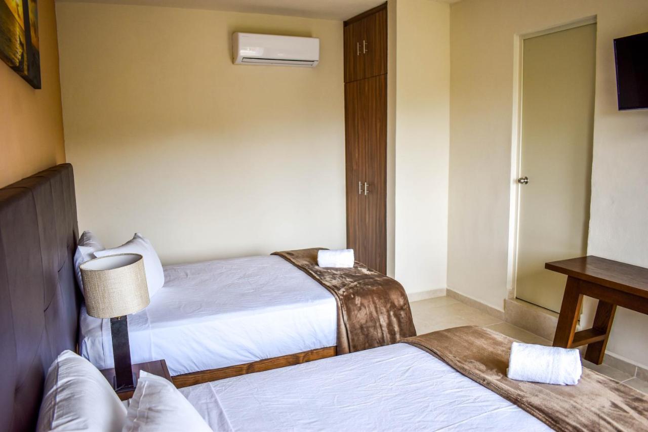פוארטו מורלוס Hotel Muchin מראה חיצוני תמונה